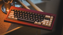 Load image into Gallery viewer, curve 65 keyboard in red on cork angled hanging off shelf