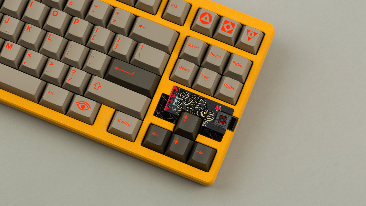 Sunflower yellow MATRIX 8XV 3 ⅓ zoomed in on the right side angled featuring grayish brown keycaps with red lettering