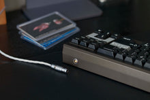 Load image into Gallery viewer, NoryTek70 back view angled on desk