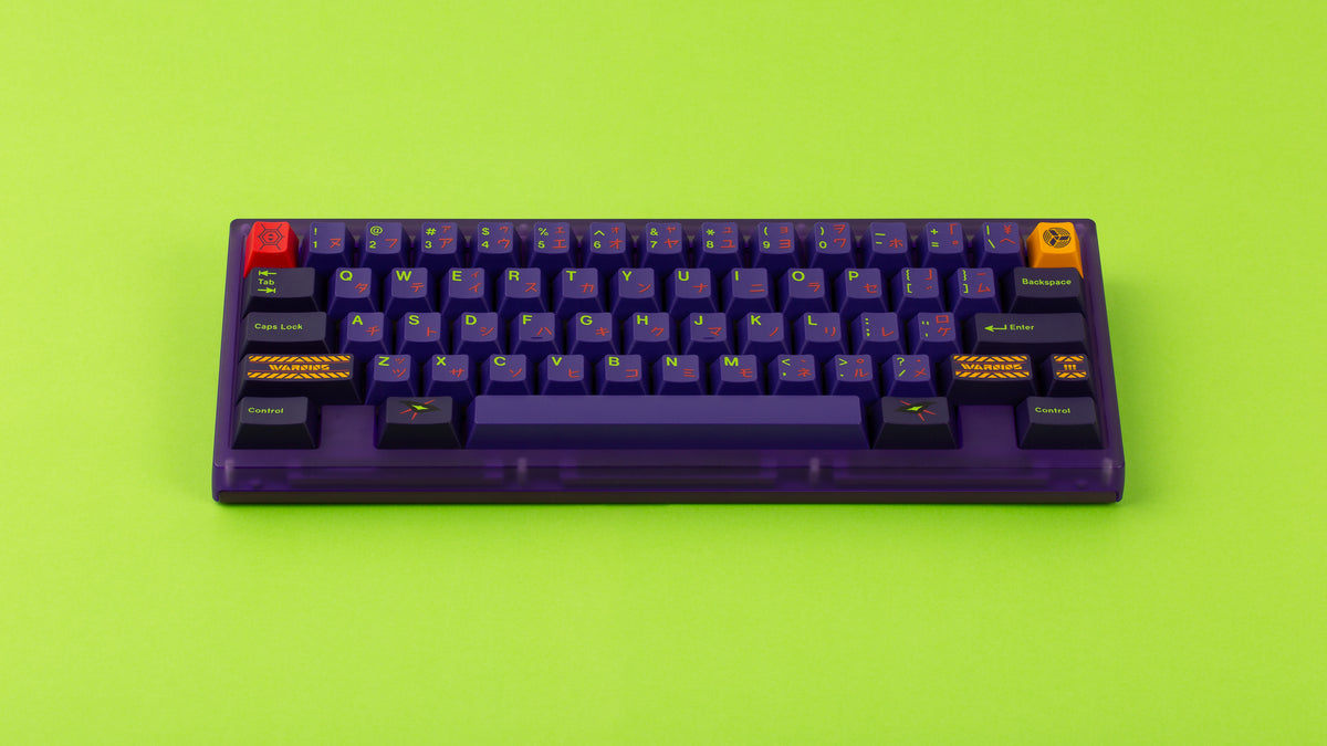  Beetle 60 in purple with keycaps on a green background 