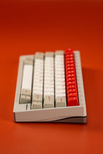 Load image into Gallery viewer, Keyboard with red and white keys on a red background