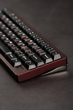 Load image into Gallery viewer, Close-up of a mechanical keyboard with a dark background