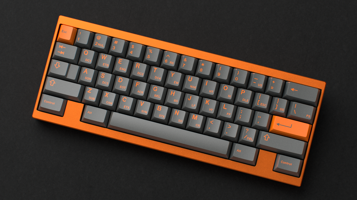  render of GMK CYL Carbon R3 on an orange keyboard angled 