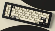 Load image into Gallery viewer, render of GMK CYL Creme on a black keyboard angled