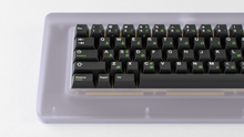 Load image into Gallery viewer, render of GMK CYL Griseann R2 on a translucent piggy