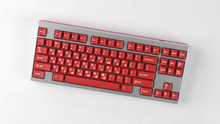 Load image into Gallery viewer, render of crimson cadet on a silver keyboard angled top down