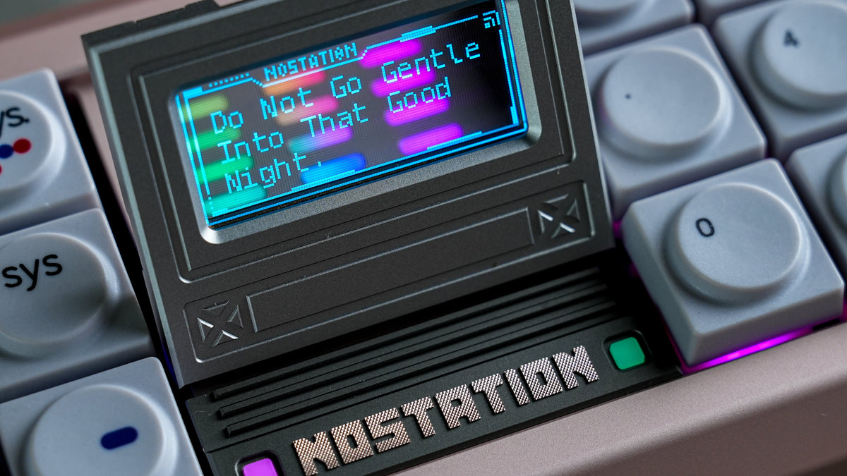  Matrix NOSTATION close up of screen with the text: Do not go gentle into that good night 
