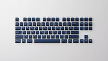 Load image into Gallery viewer, GMK CYL Blue Fabrik Base Set - dark navy keycaps with white legends and orange accent GMK logo and Return key