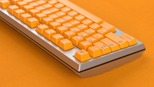 Load image into Gallery viewer, render of GMK CYL ADA on a keycult no 3 close up of right side angled with an orange background