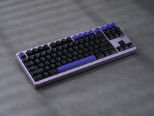 Load image into Gallery viewer, GMK CYL PoB purple keycaps on keyboard, wide angle lifestyle shot