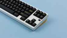 Load image into Gallery viewer, GMK CYL 1520 on a White Keyboard close up on right side