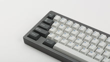 Load image into Gallery viewer, GMK CYL Arctic on grey keyboard zoomed in on left