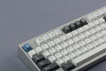 Load image into Gallery viewer, GMK CYL Arctic on silver keyboard zoomed in on left