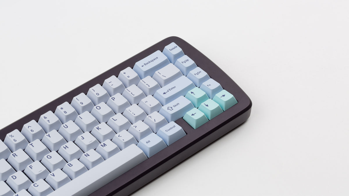  GMK CYL Astral Light on a purple keyboard close up on the right side 