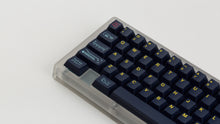 Load image into Gallery viewer, GMK CYL Awaken on a clear keyboard zoomed in on left