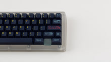 Load image into Gallery viewer, GMK CYL Awaken on a clear keyboard zoomed in on right