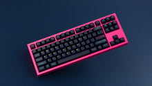 Load image into Gallery viewer, GMK CYL Awaken on a pink NK87 keyboard angled