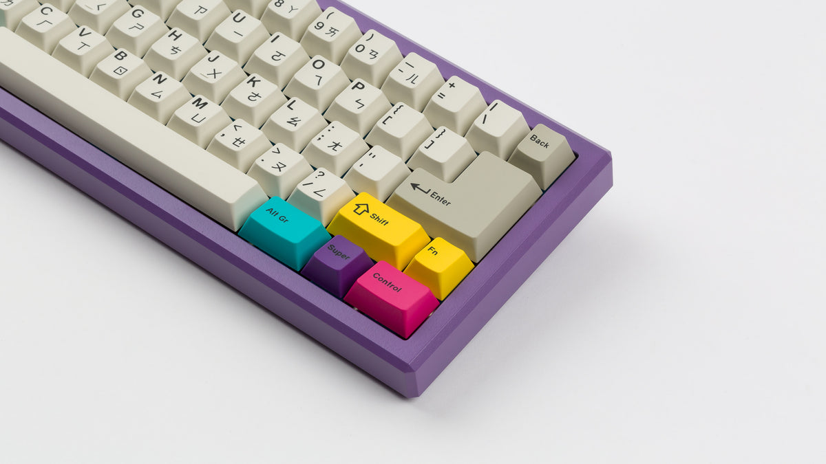  GMK CYL Beige Addon on a purple keyboard zoomed in on right 