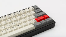 Load image into Gallery viewer, GMK CYL Beta JS on a black keyboard close up on right side angled