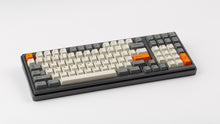 Load image into Gallery viewer, GMK CYL Beta on a grey keyboard