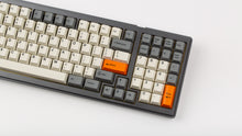 Load image into Gallery viewer, GMK CYL Beta on a grey keyboard close up on right side