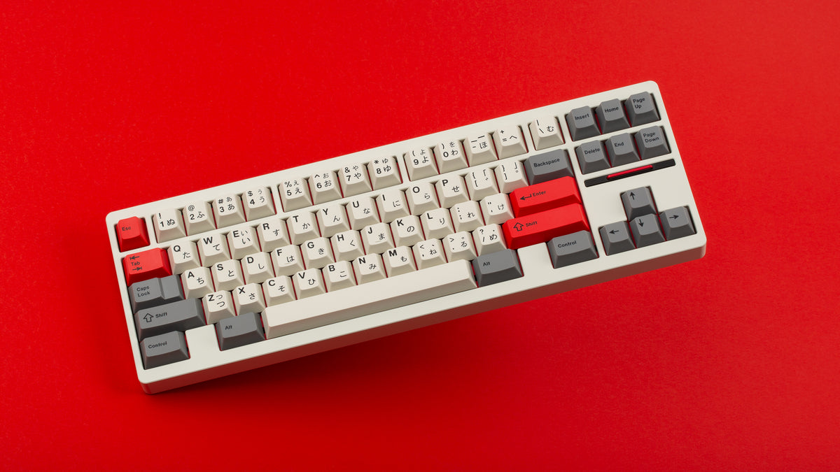  GMK CYL Beta JS on a clear CLASSIC-TKL with red background 