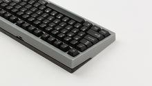 Load image into Gallery viewer, GMK CYL Black Snail on a silver 7V back view zoomed in on left