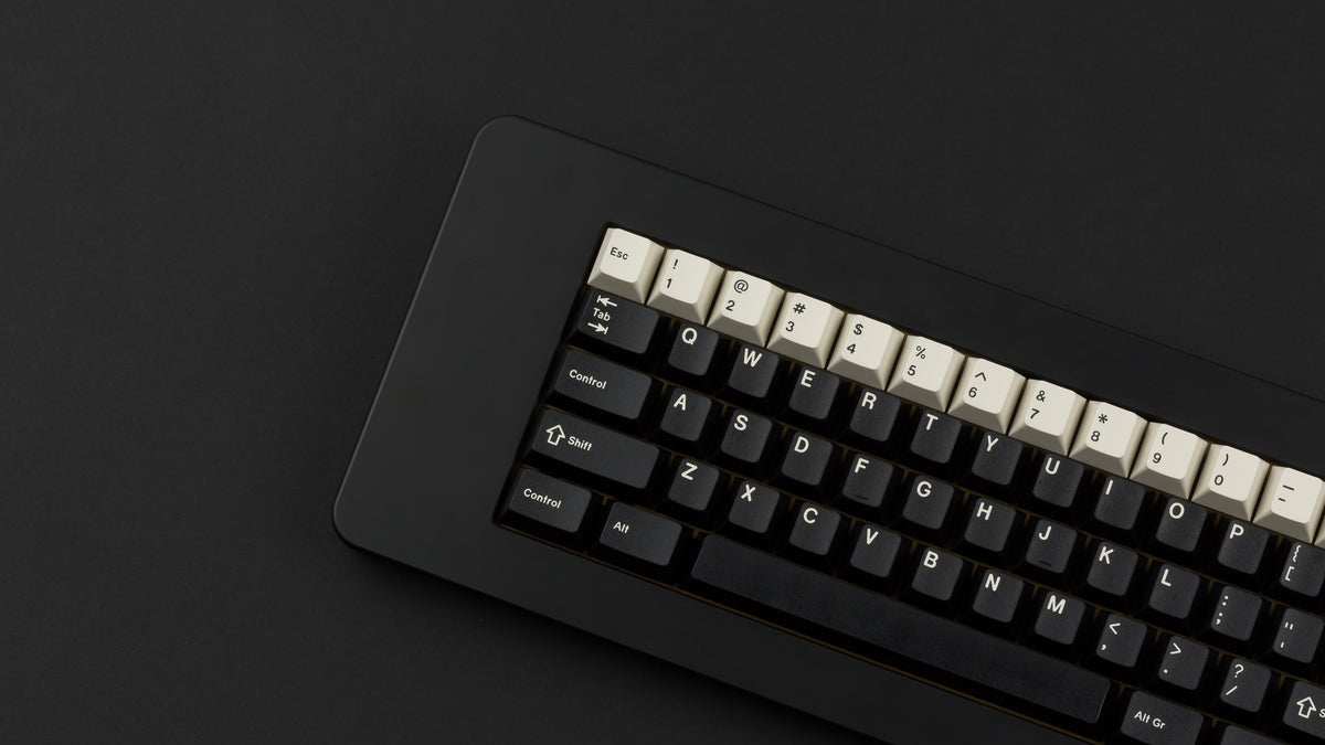  GMK CYL Black Snail on a black keyboard zoomed in on left 