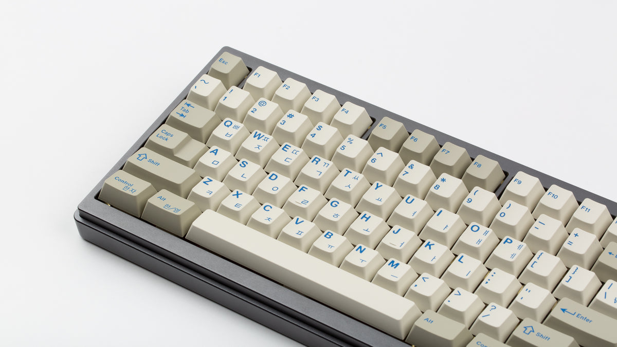  GMK CYL Blue Alert R2 on a grey keyboard angled close up on left side 