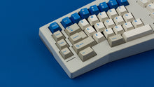 Load image into Gallery viewer, GMK CYL Blue Alert R2 on a TYPE K close up of left side