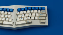 Load image into Gallery viewer, GMK CYL Blue Alert R2 on a TYPE K close up on right side