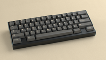 Load image into Gallery viewer, render of GMK CYL Boneyard on a black keyboard angled