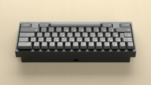 Load image into Gallery viewer, render of GMK CYL Boneyard on a black keyboard back view