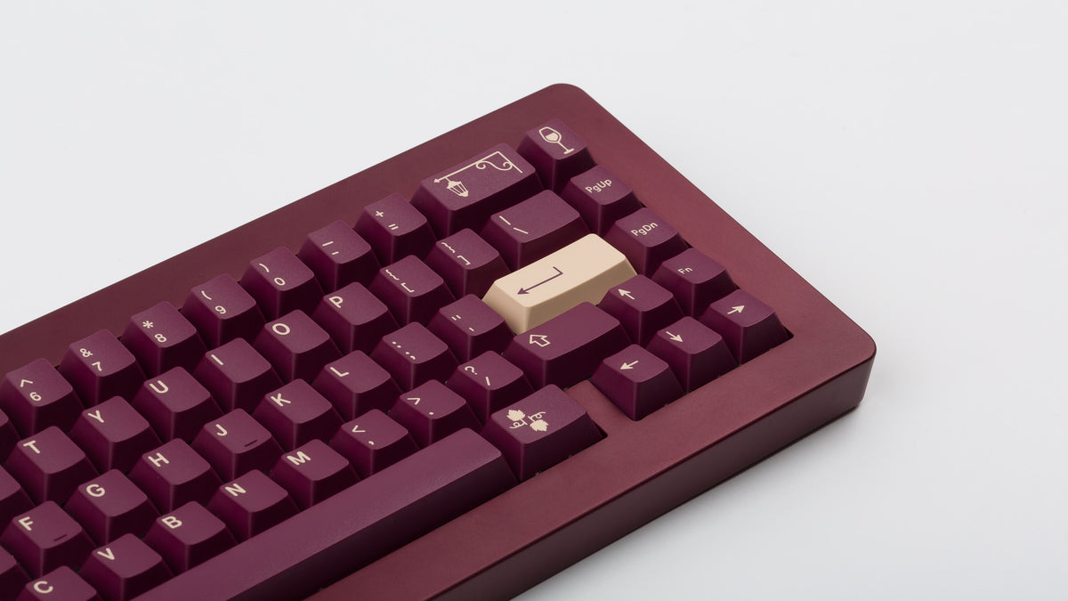  GMK CYL Bordeaux on maroon Keyboard zoomed in on right 