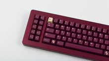 Load image into Gallery viewer, GMK CYL Bordeaux on maroon Keyboard zoomed in on left