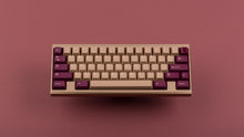 Load image into Gallery viewer, GMK CYL Bordeaux on gold keyboard