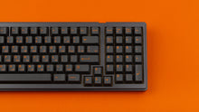 Load image into Gallery viewer, GMK CYL Carbon R3 on a black keyboard close up on right side