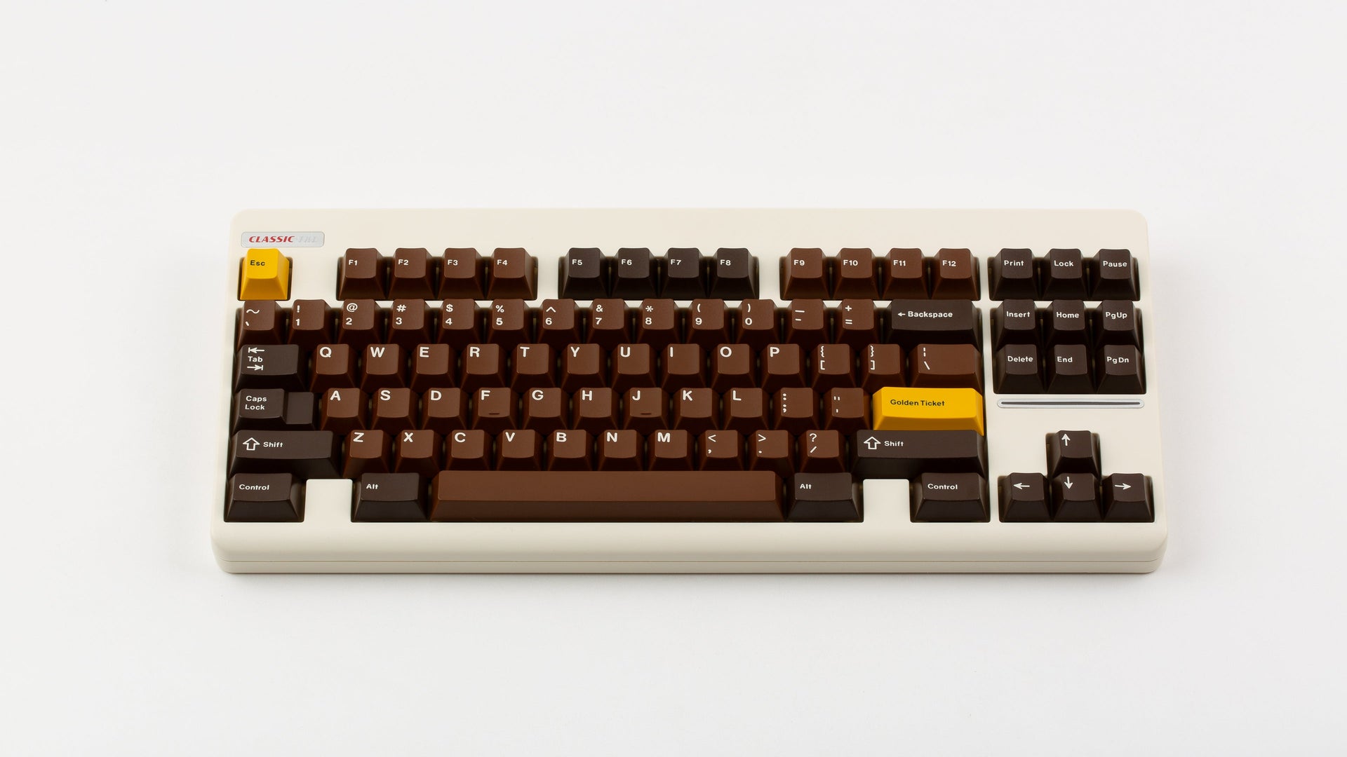 GMK CYL Chocolatier keycaps on cream NK Classic TKL keyboard, full angled view with golden Esc and Golden Ticket accent keys