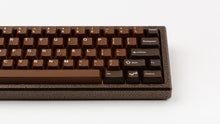 Load image into Gallery viewer, GMK CYL Chocolatier keycaps on dark brown hammered-texture 60% keyboard, close-up of right side