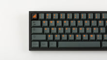 Load image into Gallery viewer, GMK CYL Cinder on black NK65 zoomed in on left