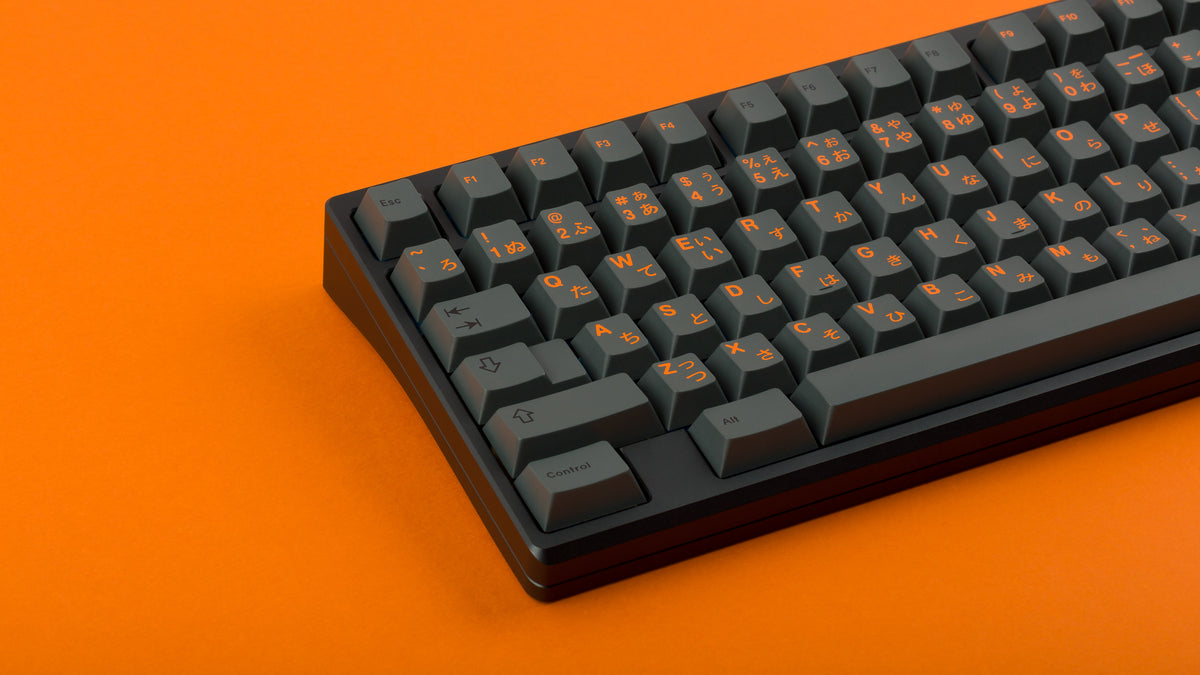  GMK CYL Cinder on black keyboard zoomed in on left 