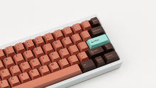 Load image into Gallery viewer, GMK CYL Copper on a white keyboard close up on right side