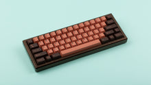 Load image into Gallery viewer, GMK CYL Copper on a hammered copper keyboard 