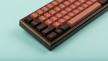 Load image into Gallery viewer, GMK CYL Copper on a hammered copper keyboard close up of left side
