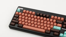 Load image into Gallery viewer, GMK CYL Copper on a black CLASSIC-TKL keyboard close up on left side