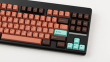 Load image into Gallery viewer, GMK CYL Copper on a black CLASSIC-TKL keyboard close up on right side