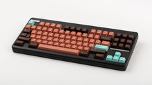 Load image into Gallery viewer, GMK CYL Copper on a black CLASSIC-TKL keyboard angled