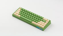 Load image into Gallery viewer, GMK CYL Cream matcha on green nk65 angled