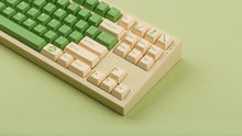 Load image into Gallery viewer, GMK CYL Cream matcha on beige NK87 zoomed in on right