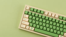 Load image into Gallery viewer, GMK CYL Cream matcha on beige NK87 zoomed in on left